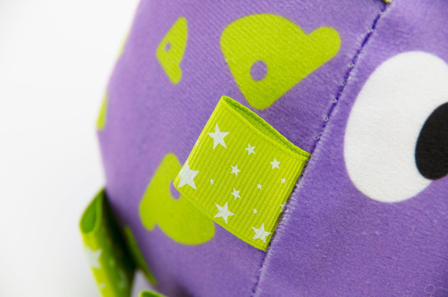 Big Eyed Grab Tabs Pup Ball Toy (Grape Pop)