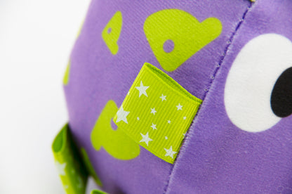 Big Eyed Grab Tabs Pup Ball Toy (Grape Pop)